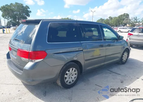 2010 Honda Odyssey Lx z USA, uszkodzony, nr VIN 5FNRL3H28AB065509